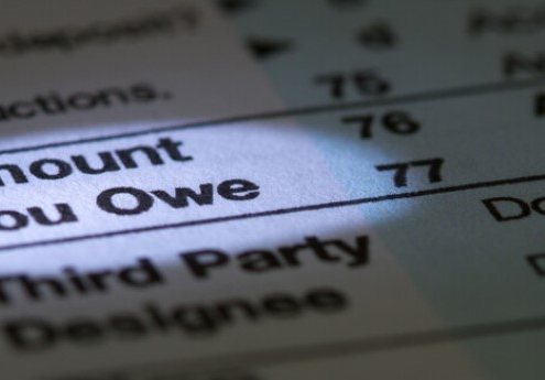 tax return with amount you owe highlighted_canstockphoto22496778 845x345